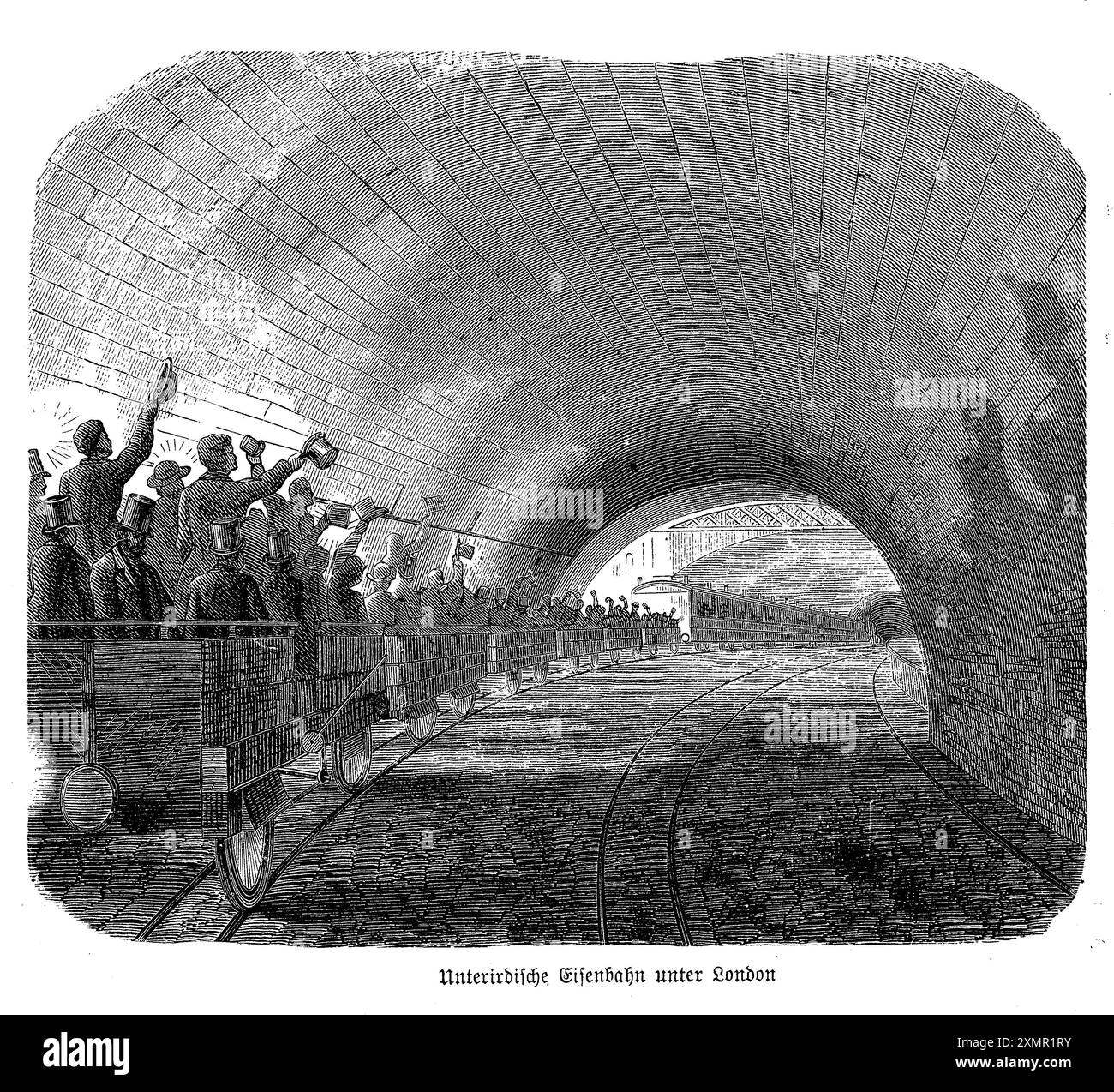 Cette gravure du métro londonien du XIXe siècle capture un moment des débuts du premier chemin de fer souterrain au monde. Les passagers sont vus rouler dans des voitures ouvertes, un contraste frappant avec les trains fermés modernes. La scène met en lumière l'esprit pionnier de l'époque, avec les habitants de la ville faisant l'expérience d'un mode de transport révolutionnaire sous les rues animées du Londres victorien. La représentation détaillée des voitures ouvertes, du tunnel souterrain et de la tenue des passagers offre un aperçu fascinant du passé, mettant en valeur le mélange d'innovation et de vie quotidienne Banque D'Images