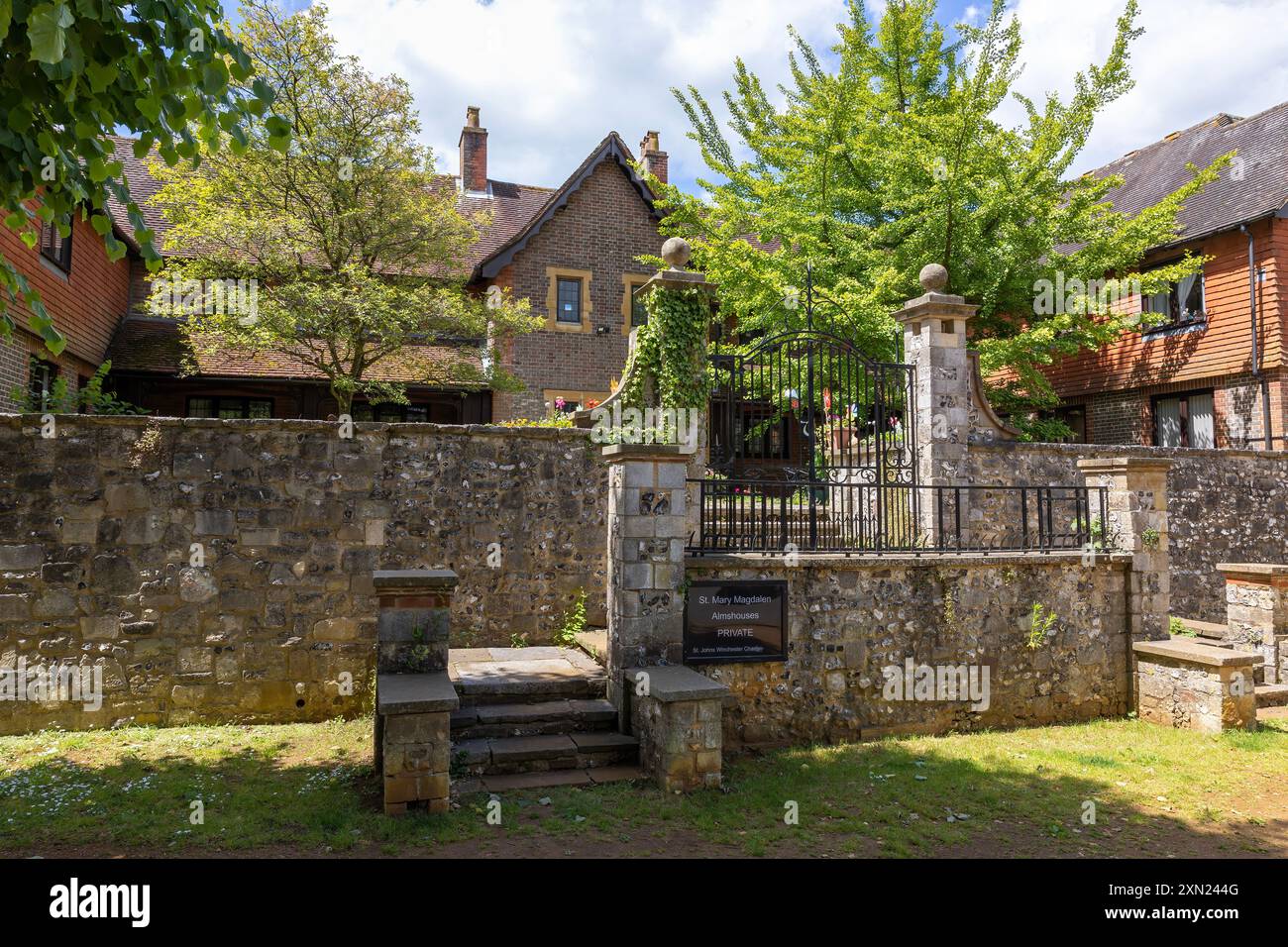 Artisanat historique à St Mary Magdalen almshouses, riche patrimoine de Winchester en pierre et silex Banque D'Images