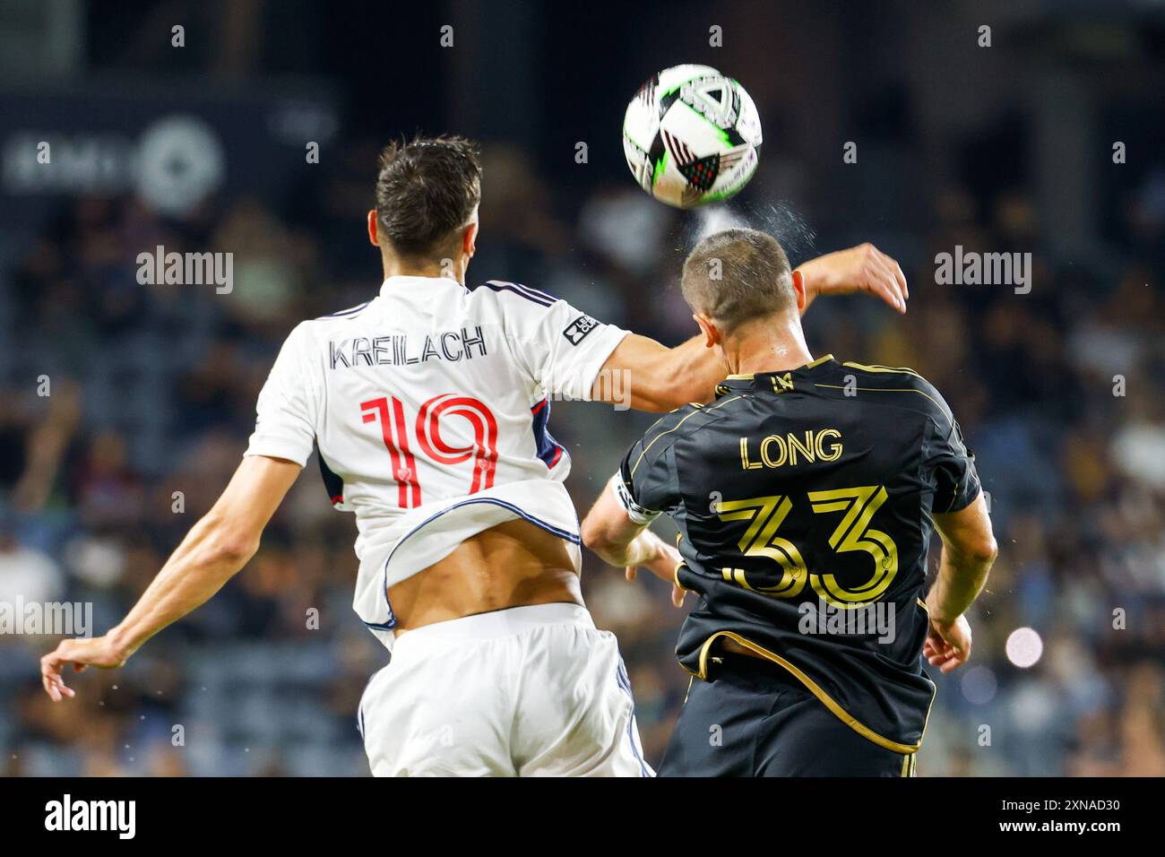 Los Angeles, États-Unis. 30 juillet 2024. Damir Kreilach (G) des Whitecaps de Vancouver et Aaron long (d) du Los Angeles FC en action lors du match de la Coupe des ligues au stade BMO. Vancouver Whitecaps 4:2 LAFC (photo par Ringo Chiu/SOPA images/SIPA USA) crédit : Sipa USA/Alamy Live News Banque D'Images