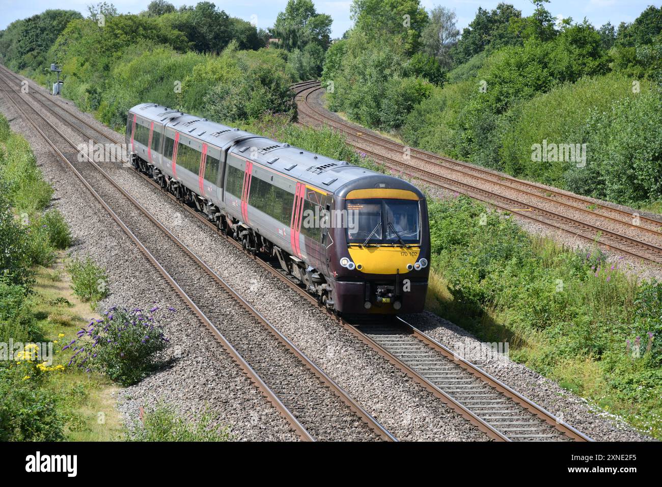 ADtranz construit 3 voitures Class 170 TurboStar 170102 à l'approche de North Stafford Junction avec la 11:09 Birmingham New Street à Nottingham le 26 juillet 2024 Banque D'Images
