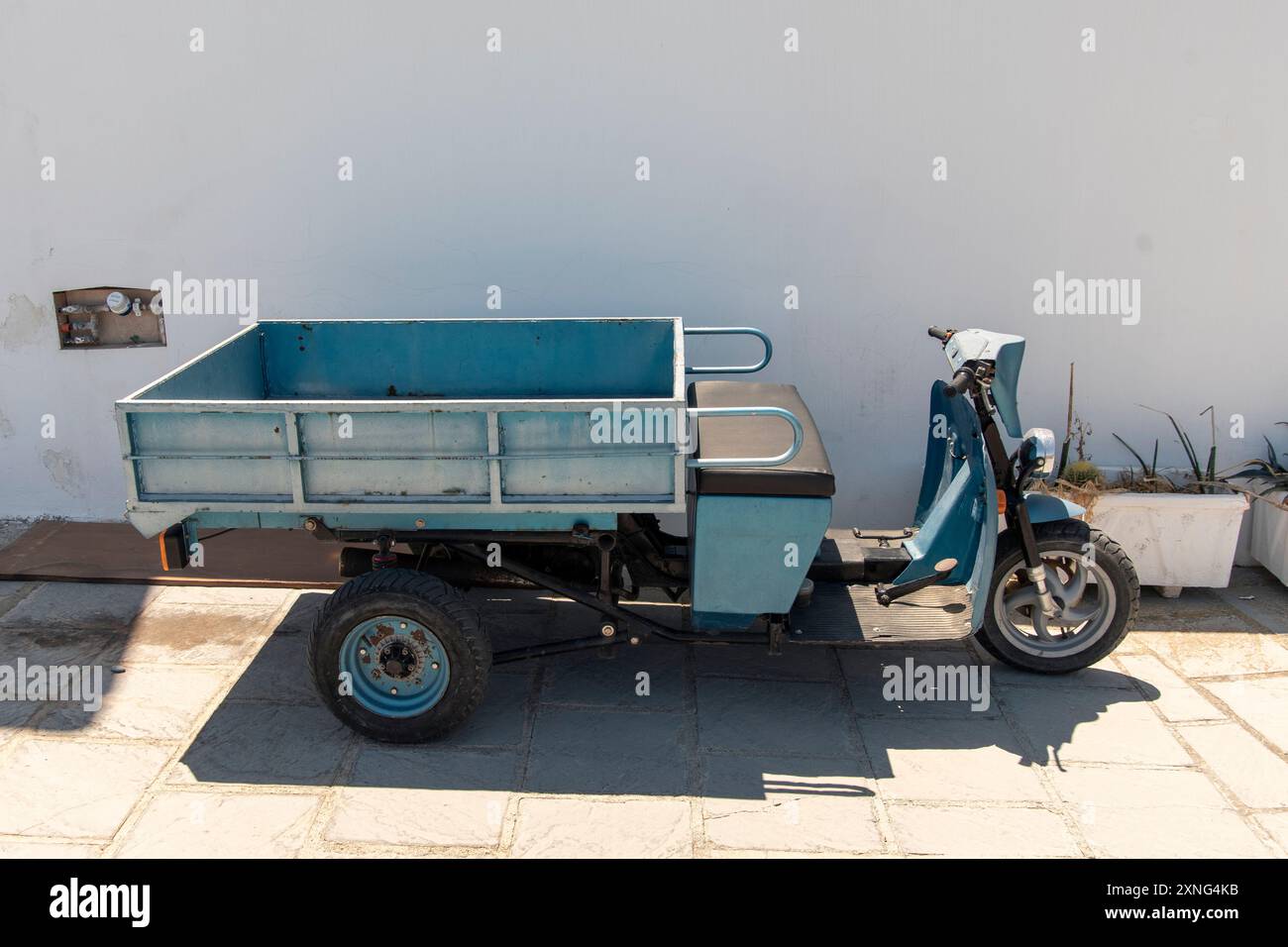 Cute 3 roues Trucks à Lindos, sur l'île grecque de Rhodes Banque D'Images