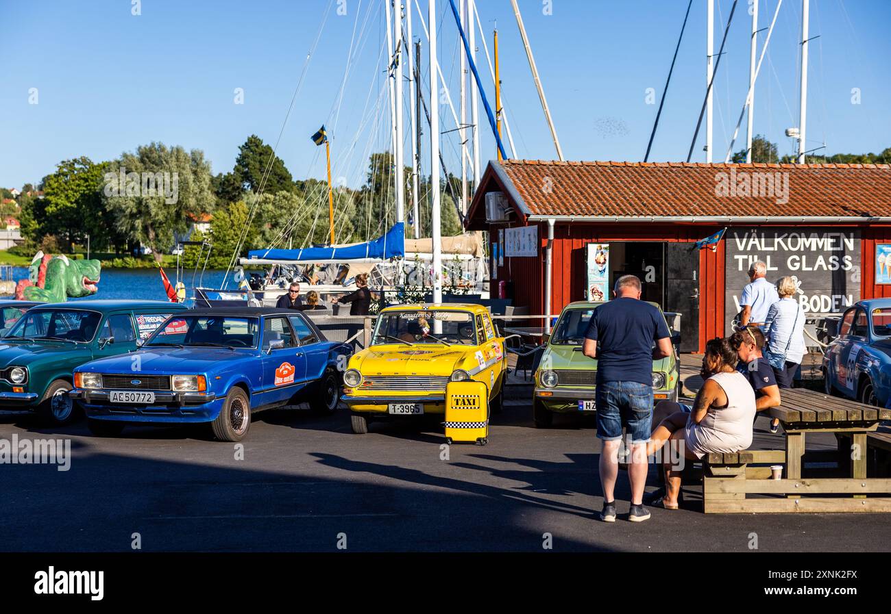 Motala, Suède. 31 juillet 2024. Tourisme suédois, pilotes de Norvège avec de vieilles voitures rétro dans le port de Motala, Suède, pendant le 'Rally Classic 2024'. Crédit : Jeppe Gustafsson/Alamy Live News Banque D'Images