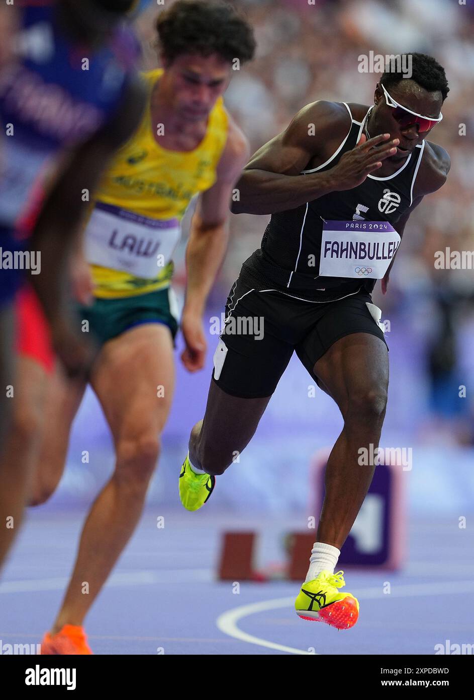 Paris, France. 5 août 2024. Joseph Fahnbulleh (R), du Liberia, participe à la première ronde masculine du 200 m d'athlétisme aux Jeux Olympiques de Paris 2024 à Paris, France, le 5 août 2024. Crédit : Xu Chang/Xinhua/Alamy Live News Banque D'Images