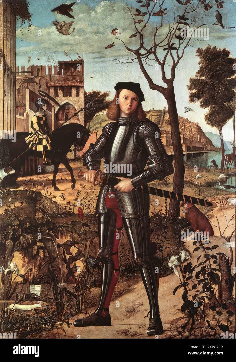 CARPACCIO, Vittore (né en 1472, Venezia, décédé en 1526, Capodistria) Portrait d'un chevalier 1510 Tempera sur toile, 218 x 152 cm Collection Thyssen-Bornemisza, Madrid le jeune homme, debout avec ses jambes légèrement écartées, est représenté alors qu'il dégaine son épée: il domine le paysage qui est également représenté avec une attention flamande aux détails. Nous pouvons distinguer toutes les espèces de flore et de faune, et avec exactement la même précision et perfection graphique le profil du chevalier à cheval se distingue contre les murs du château ; dans la perspective raccourcie de la section à gauche, nous pouvons faire Banque D'Images