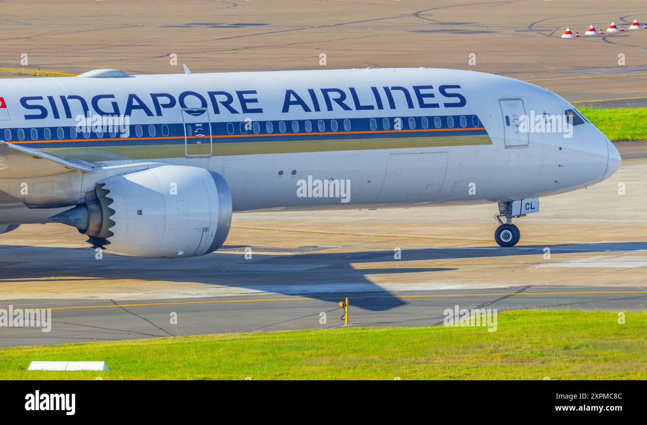 Un jet Singapore Airlines sur le tarmac de l'aéroport de Sydney (Kingsford Smith) à Sydney, en Australie. Banque D'Images