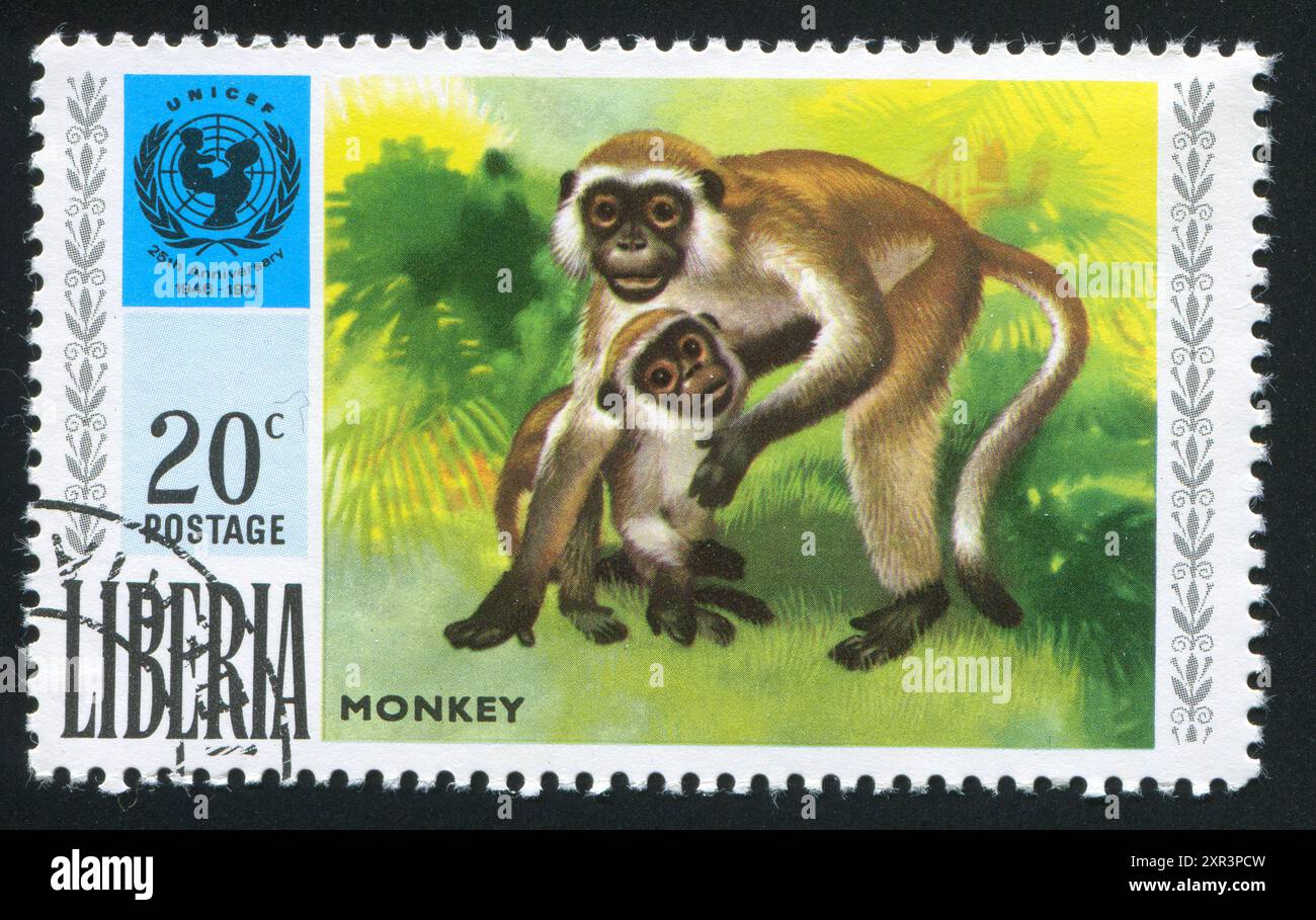 LIBERIA - VERS 1971 : timbre imprimé par Liberia, montrant l'emblème de l'UNICEF et le singe, vers 1971 Banque D'Images