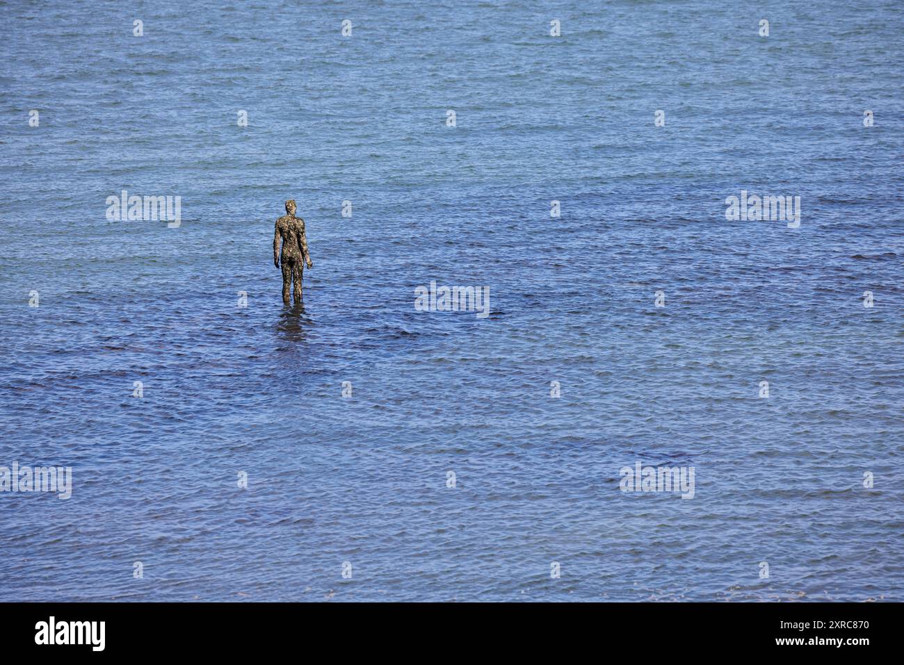 Antony Gormley une autre fois Statue. UNE AUTRE FOIS est une série de cent figures solides en fonte d'Antony Gormley Banque D'Images