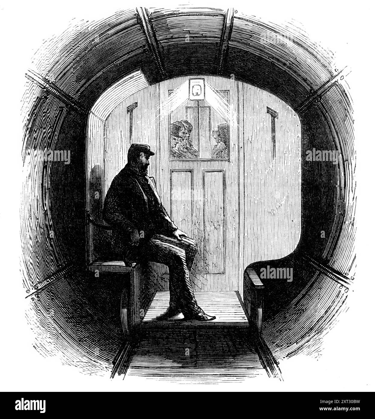 Le métro de la Tamise à Tower-Hill : omnibus Carriage, 1870. Tunnel sous la Tamise à Londres, conçu par William Henry Barlow. « Le métro se compose d'un tunnel étroit réunissant deux puits verticaux... sur le chemin de fer passe un omnibus transportant douze passagers. L'omnibus... est relié par une corde de fil d'acier... a chaque extrémité du tunnel ce fil passe sur un tambour, travaillé par un moteur stationnaire... L'omnibus est muni de freins, de sorte que son mouvement est complètement sous le contrôle de l'homme en charge. A chaque extrémité du tunnel, il est reçu par des tampons, ou captures, qui sont connectés wi Banque D'Images