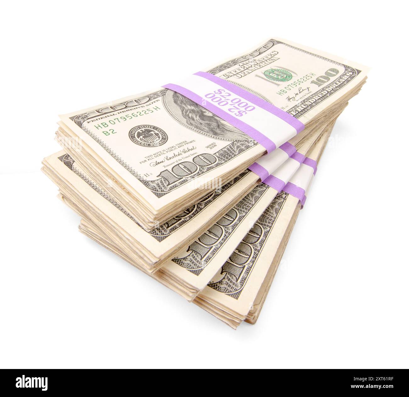 Dix mille dollars en piles de billets de cent dollars isolés sur White. Banque D'Images Dix mille dollars en piles de billets de cent dollars isolés sur White. Banque D'Images