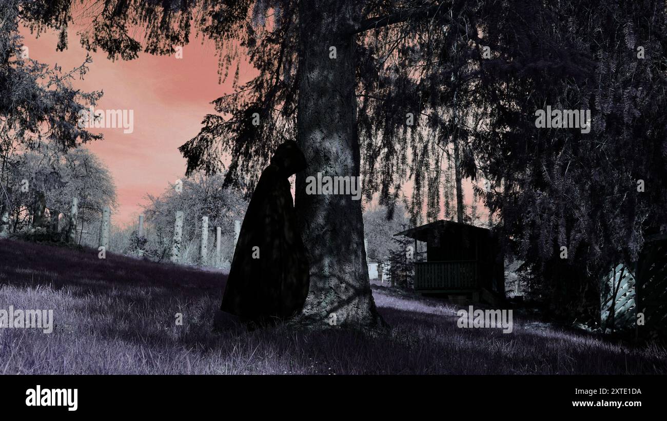 Figure effrayante à capuche appuyée contre un arbre. Un ciel rouge. Concept de la fin du monde. Banque D'Images