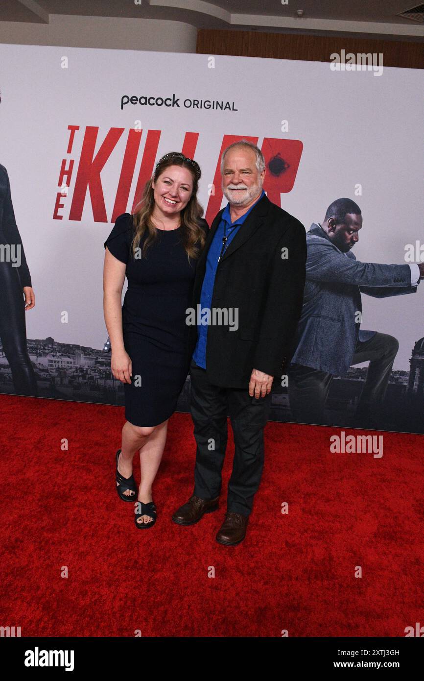 Los Angeles, Californie, États-Unis 14 août 2024 le réalisateur/producteur Arthur Anderson et Michelle Lewis assistent à la première Universal Pictures The Killer au Regal L.A. Live le 14 août 2024 à Los Angeles, Californie, États-Unis. Photo de Barry King/Alamy Live News Banque D'Images