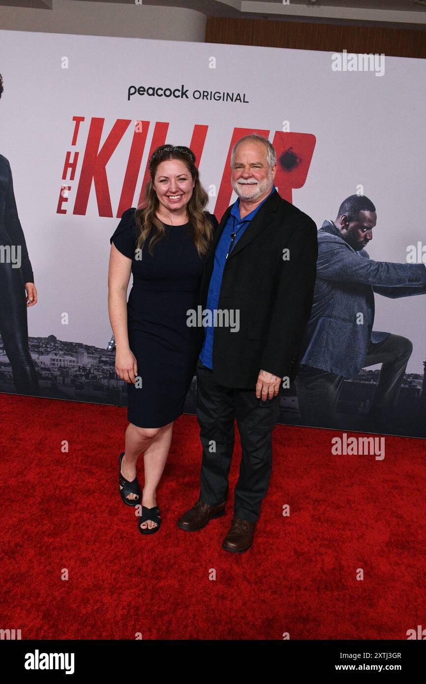 Los Angeles, Californie, États-Unis 14 août 2024 le réalisateur/producteur Arthur Anderson et Michelle Lewis assistent à la première Universal Pictures The Killer au Regal L.A. Live le 14 août 2024 à Los Angeles, Californie, États-Unis. Photo de Barry King/Alamy Live News Banque D'Images