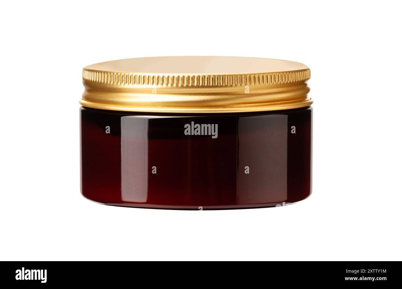 pot en verre de produit de toilettage pour coiffer les cheveux couvercle doré reposant sur le côté, isolé sur fond blanc. Avec masque Banque D'Images