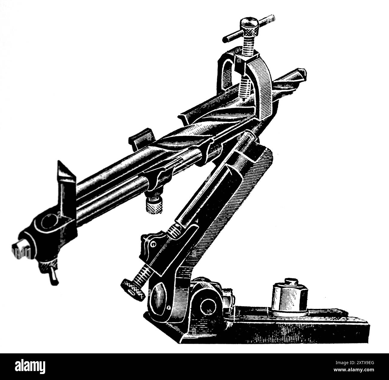 Accessoire de meulage de foret hélicoïdal simple. Cette photographie est tirée d'une large sélection d'illustrations et de photos d'ingénierie principalement non attribuées qui ont été publiées à l'origine en 1936. Les tailles et la qualité des originaux varient assez largement. Banque D'Images