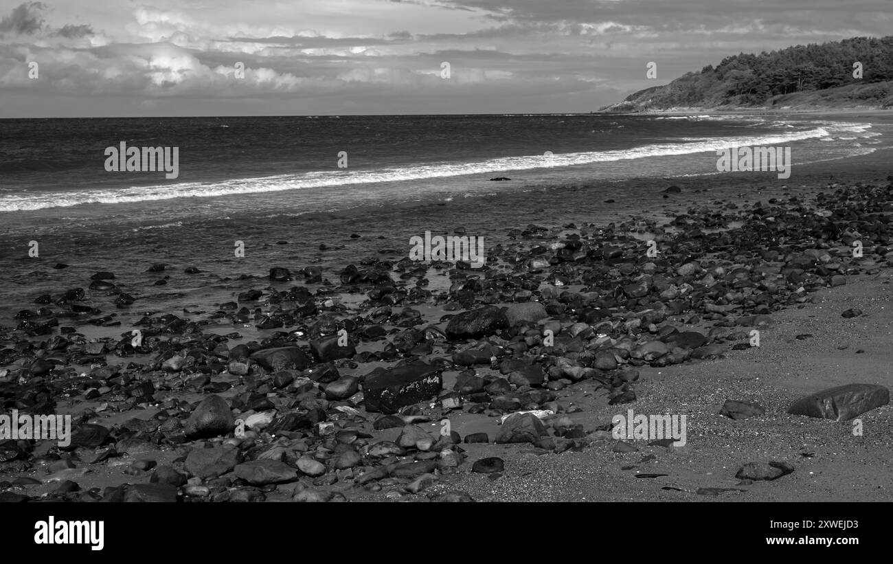 Noir et blanc de Maidens Beach, Écosse Banque D'Images