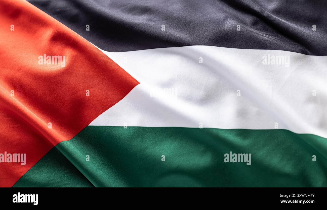 Drapeau palestinien soufflant dans le vent - gros plan. Banque D'Images