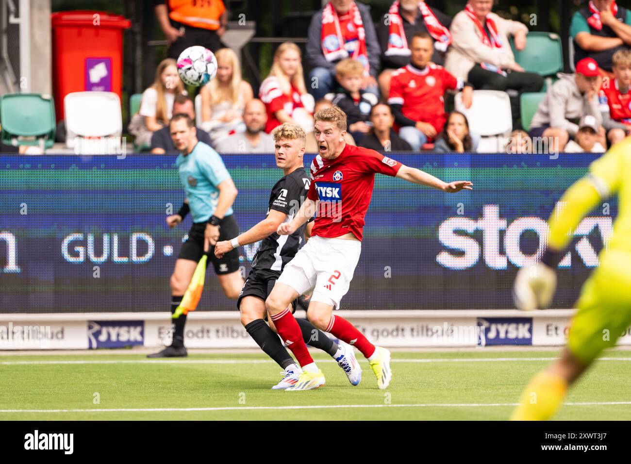 Silkeborg, Danemark. 18 août 2024. Sindre Walle Egeli (14 ans) du FC Nordsjaelland et Andreas Poulsen (2 ans) de Silkeborg lors du match de 3F Superliga entre Silkeborg IF et FC Nordsjaelland au Jysk Park à Silkeborg. Banque D'Images