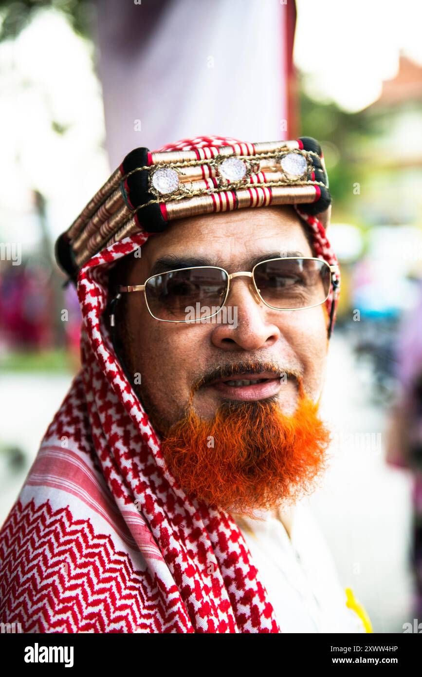 Portrait d'un malais portant un keffiyeh arabe à Georgetown, Penang, Malaisie. Banque D'Images