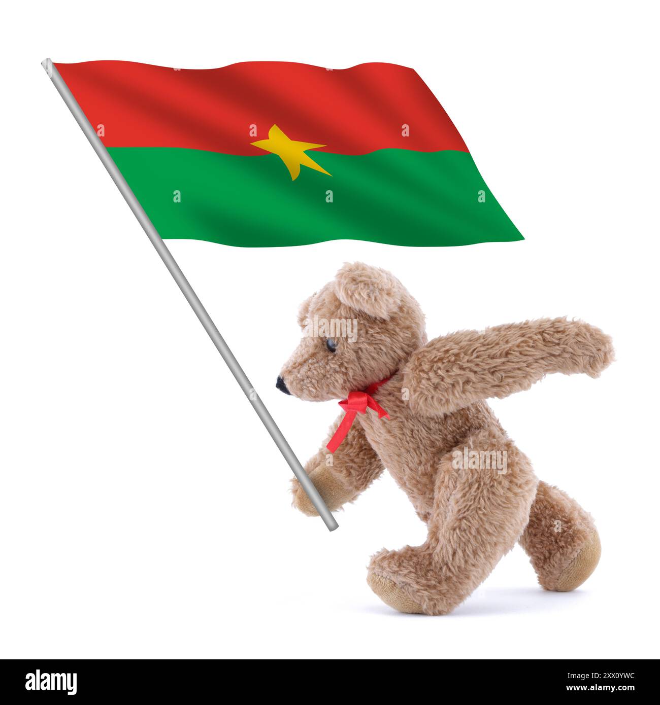 Drapeau du Burkina étant porté par un ours en peluche mignon Banque D'Images