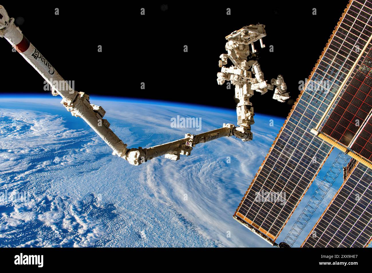 Canadaarm dans la SSI - amélioration numérique d'une image de la NASA Banque D'Images