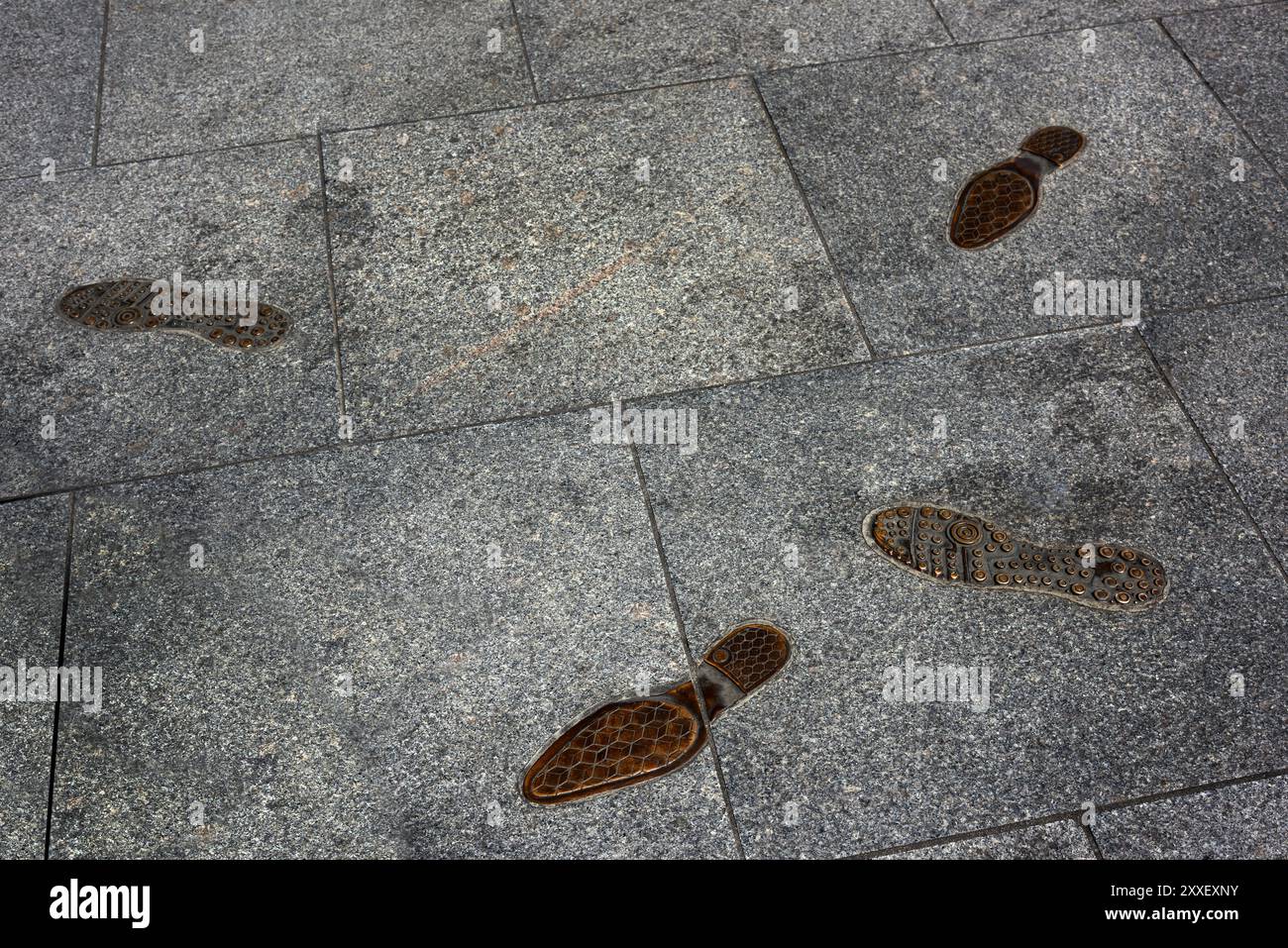 Empreintes en laiton sur le trottoir Dublin Banque D'Images