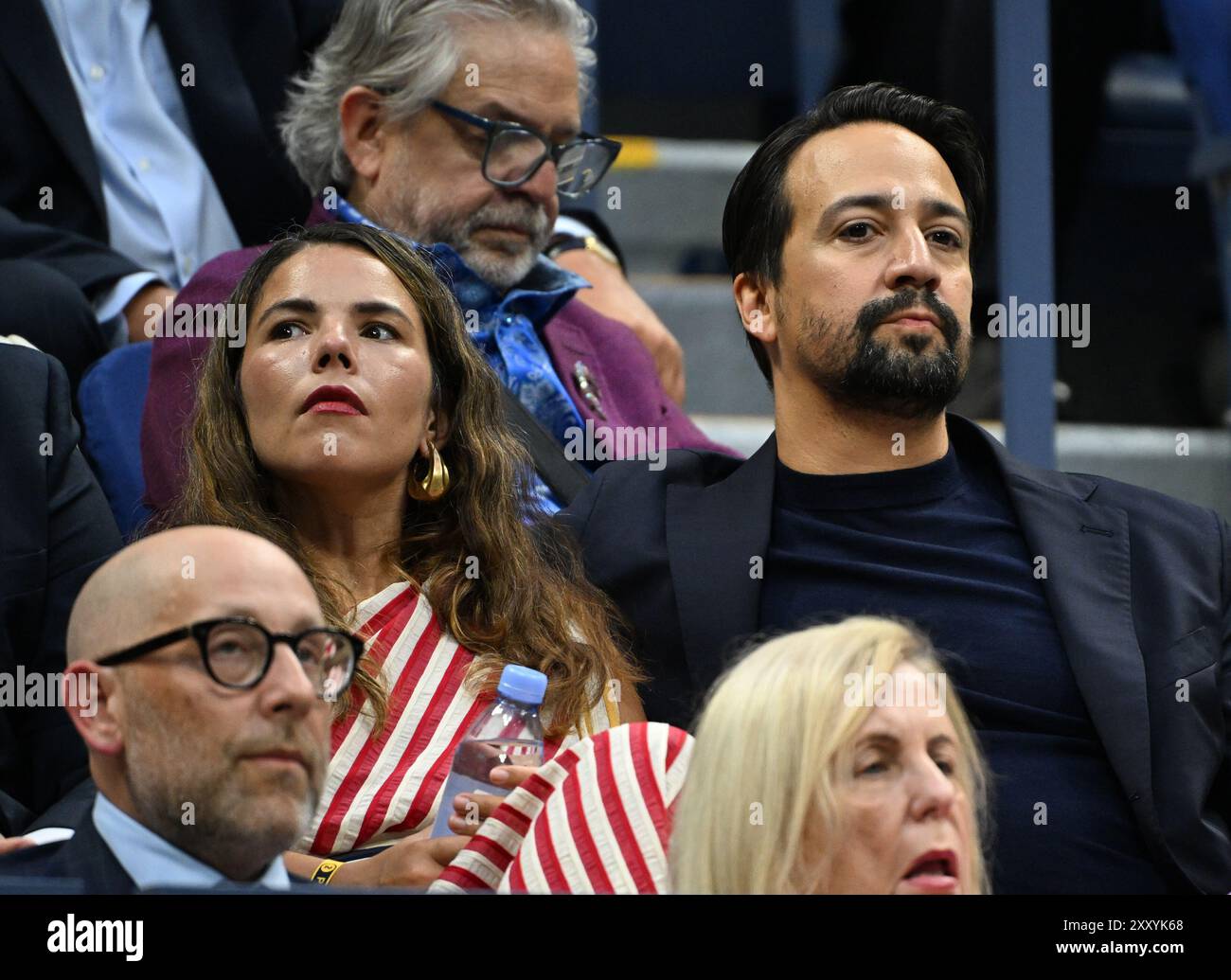 Flushing NY, États-Unis. 26 août 2024. Lin-Manuel Miranda et Vanessa Nadal regardent Sloane Stephens vs Clara Burel sur Arthur Ashe Stadium au USTA Billie Jean King National Tennis Center le 26 août 2024 à Flushing Queens. Crédit : Mpi04/Media Punch/Alamy Live News Banque D'Images