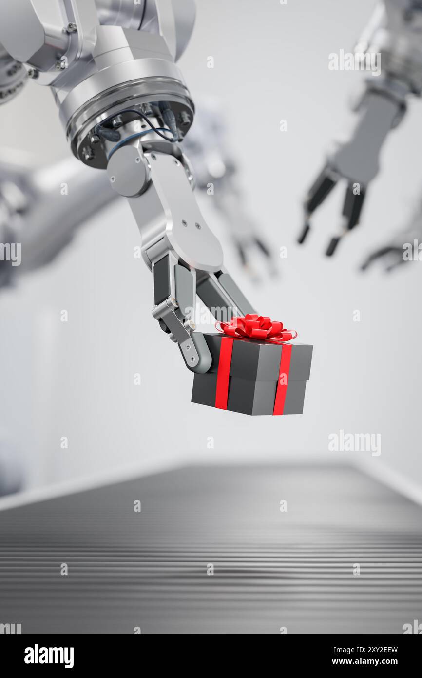 L'invention concerne un coffret cadeau placé sur une bande transporteuse par un bras robotisé. Concept de noël Tech. Mise au point sélective Banque D'Images