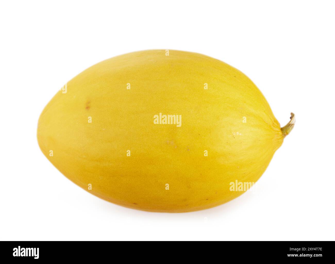 melon jaune devant un fond blanc Banque D'Images