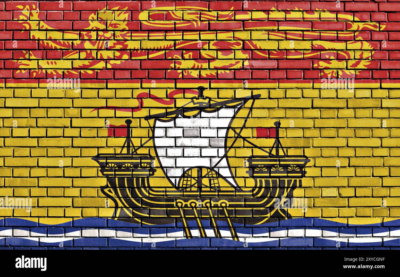 Drapeau du Nouveau-Brunswick peint sur un mur de briques Banque D'Images