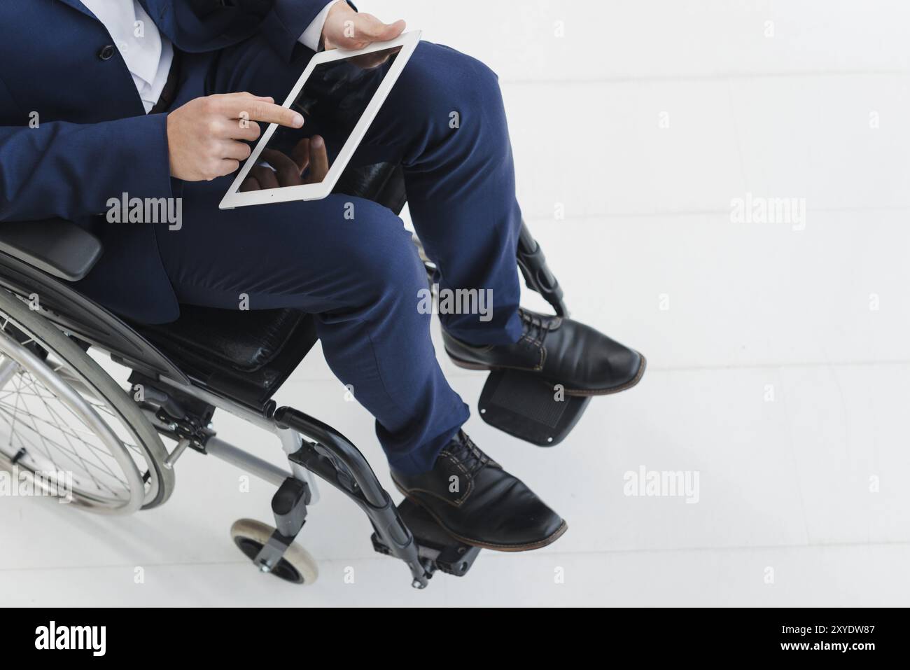 Gros plan sur le fauteuil roulant d'homme d'affaires Banque D'Images