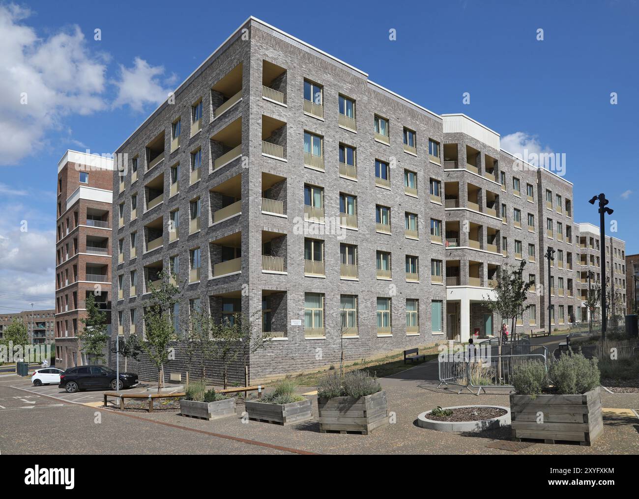 Nouvel immeuble d'appartements au développement Barking Riverside à East London, Royaume-Uni. Nouveau quartier résidentiel majeur. À l'angle de Frogley Park et Uting Street. Banque D'Images