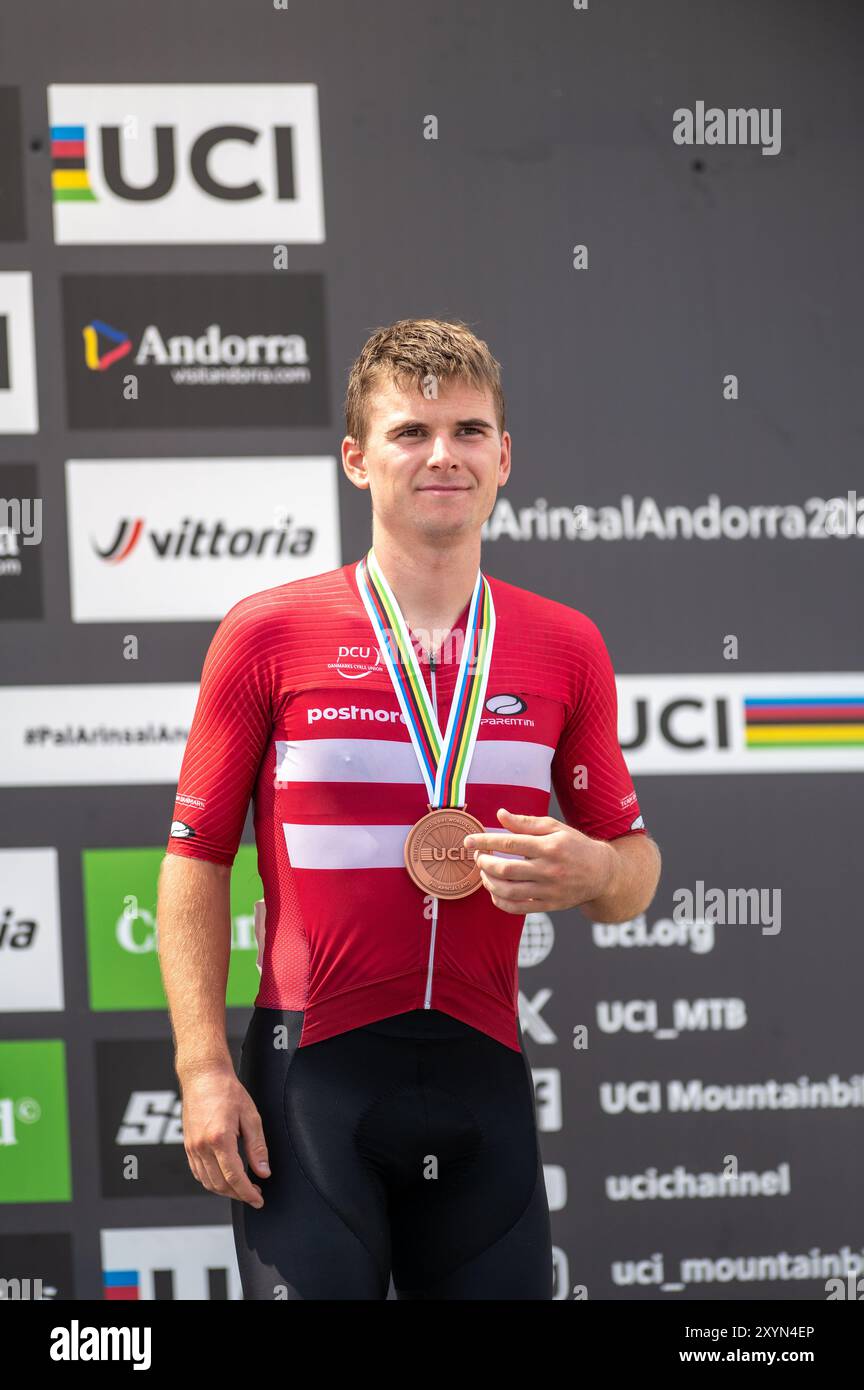 PAL Arinsal, Andorre : août 30 2024 : Henrique Hougs du DANEMARK célèbre sur le podium la troisième place du WO VTT UCI Banque D'Images