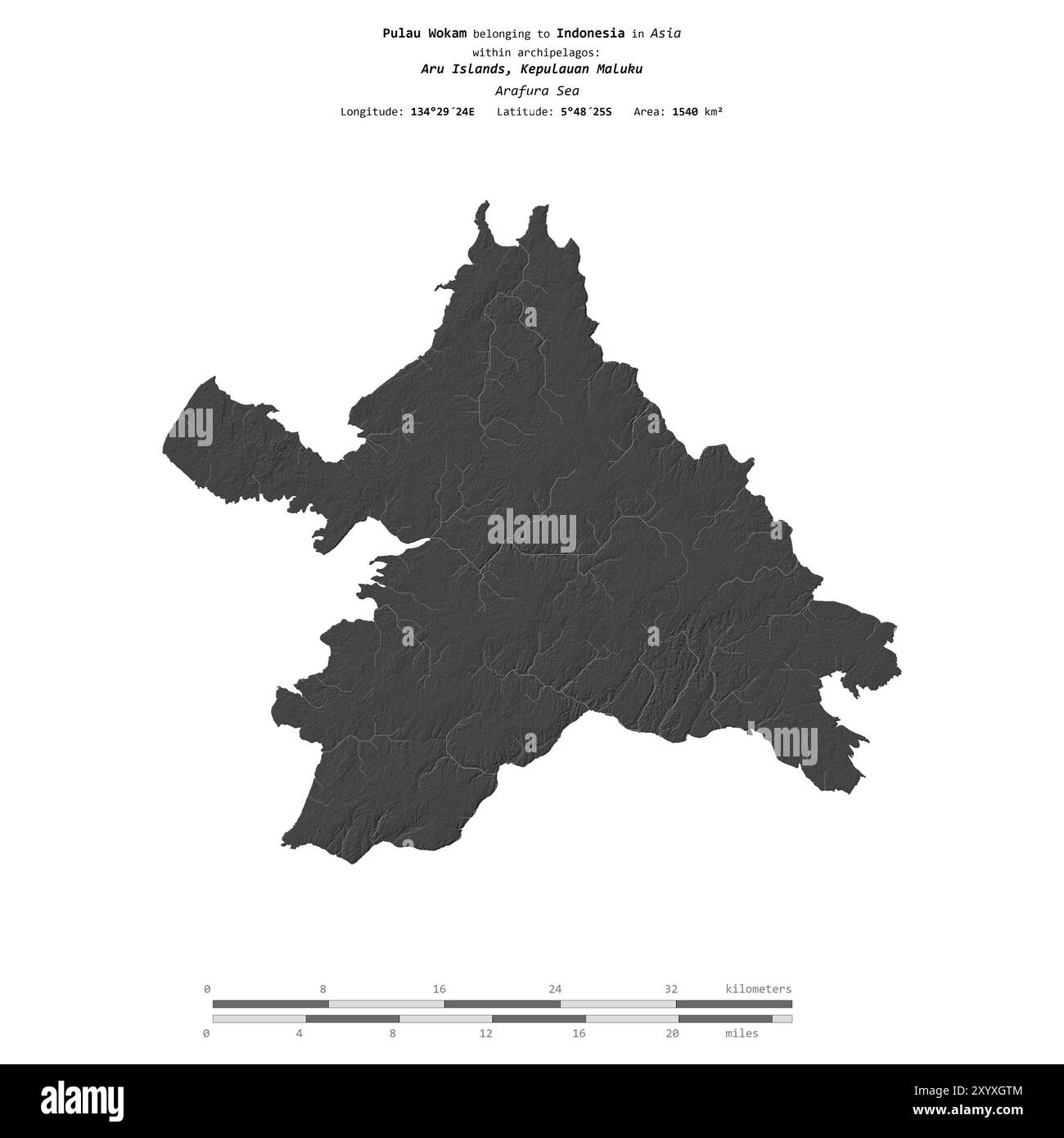 Pulau Wokam dans la mer d'Arafura, appartenant à l'Indonésie, isolé sur une carte d'altitude à deux niveaux, avec échelle de distance Banque D'Images