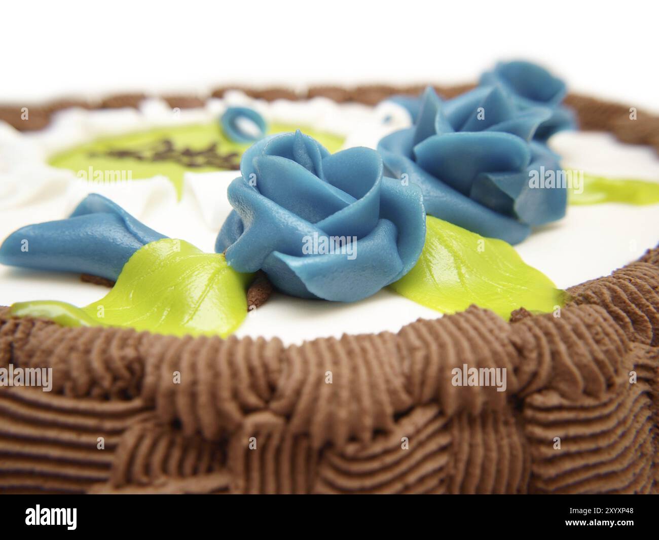 Baptême gâteau, sucre blanc, coller, blue roses Banque D'Images