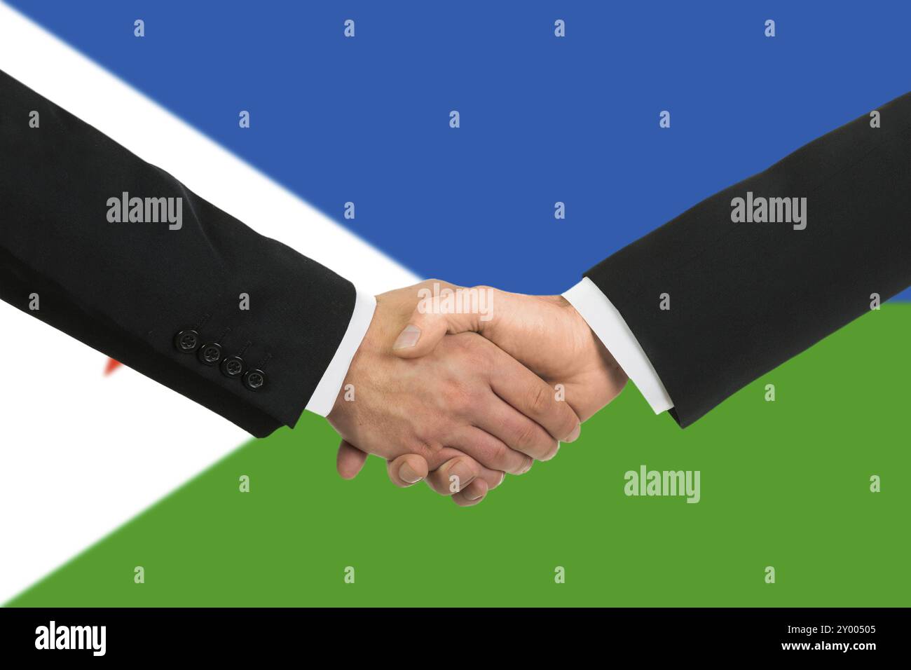 Le drapeau de Djibouti et la poignée de main des affaires Banque D'Images