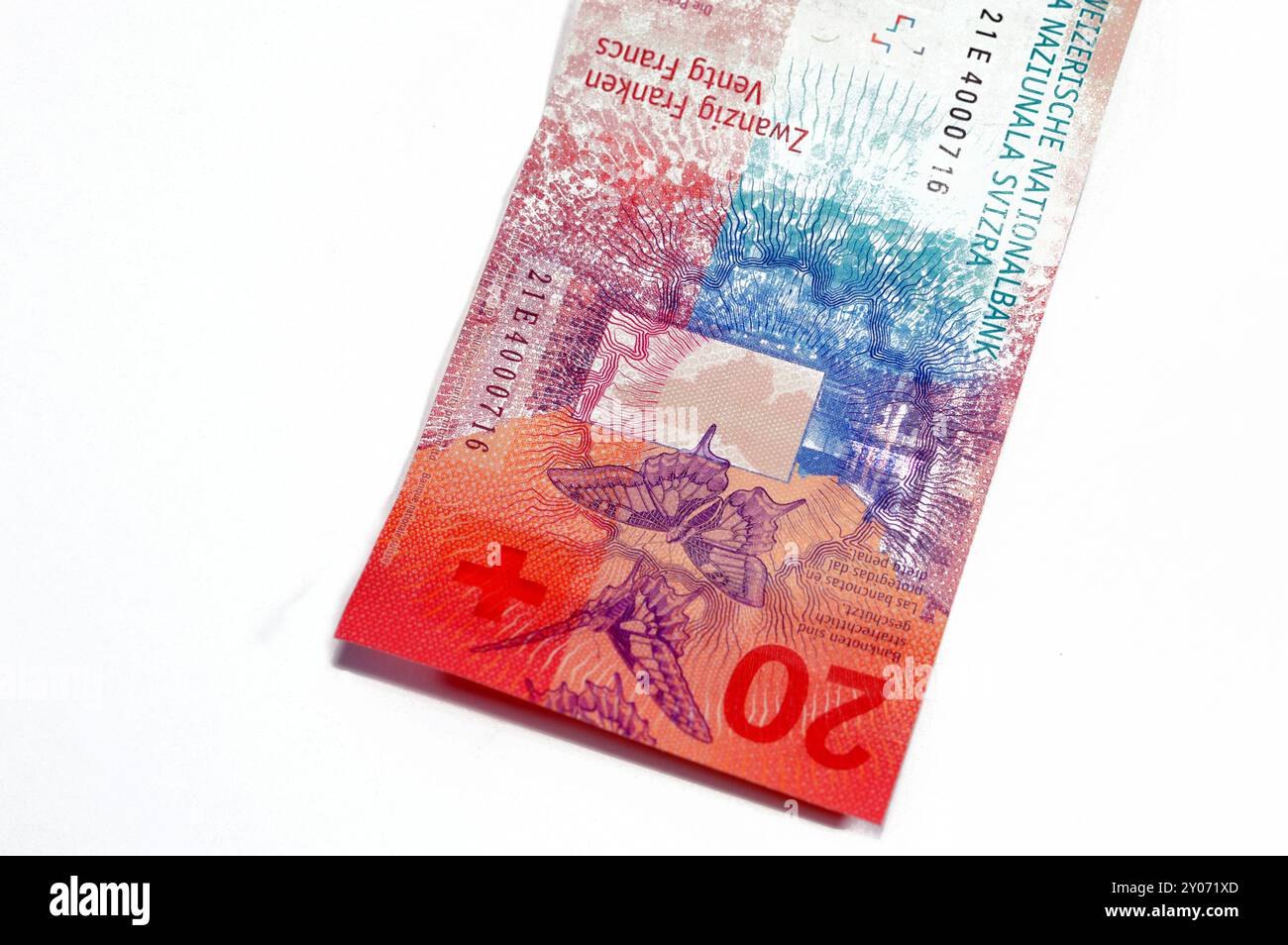 Revers de la Suisse 20 vingt francs, papillons, lumière projetée sur un écran, lignes d'iris de l'œil humain, bande de sécurité et lumière nocturne Banque D'Images