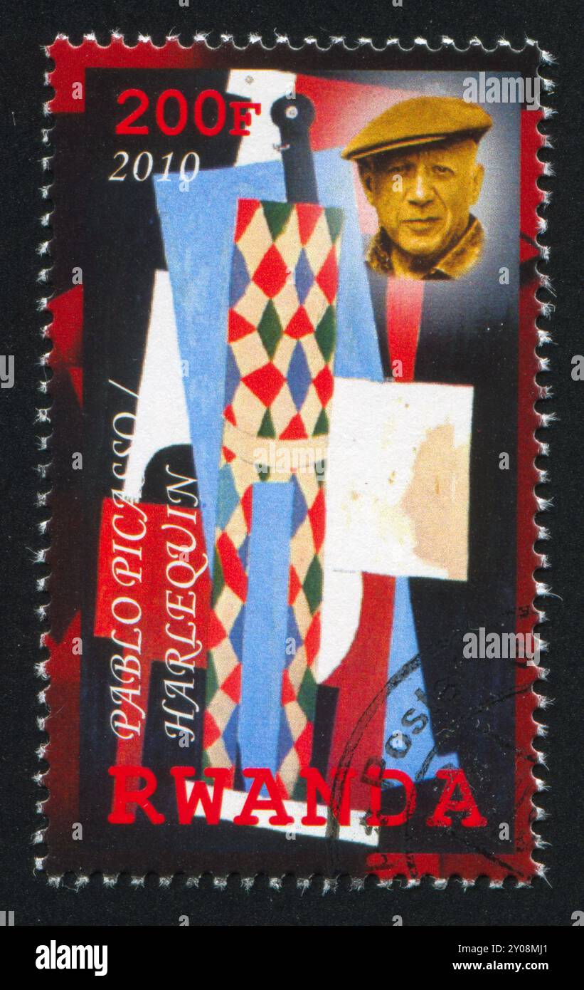 RWANDA - VERS 2010 : timbre imprimé par le Rwanda, représentant Arlequin de Pablo Picasso, vers 2010 Banque D'Images