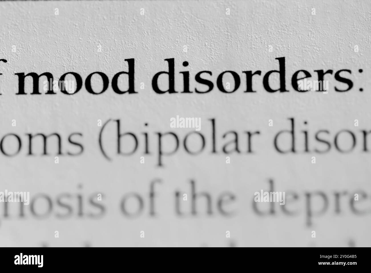 Gros plan du mot « troubles de l'humeur » du manuel de psychologie Banque D'Images