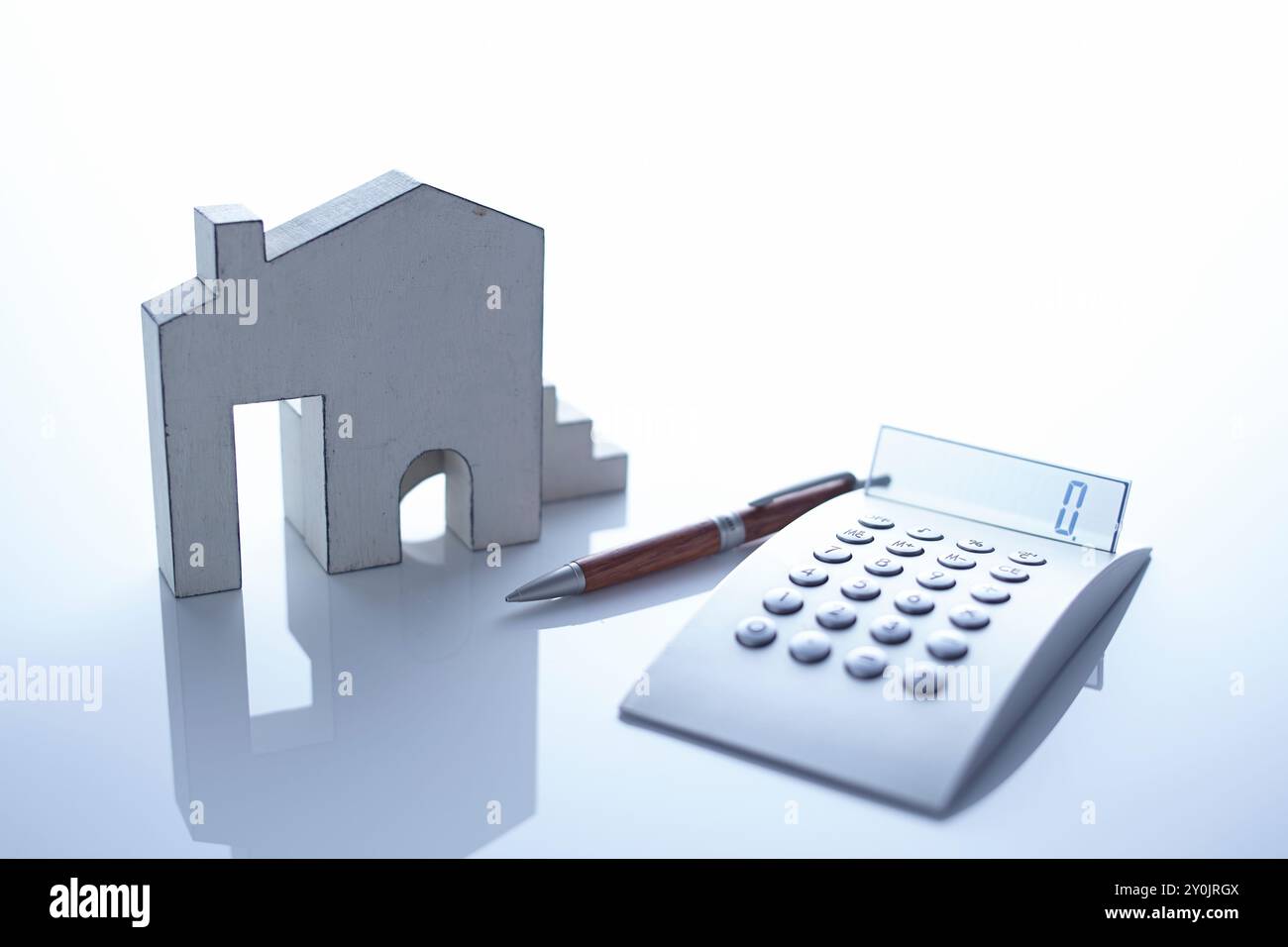 l'image commerciale de la calculatrice et de la maison Banque D'Images