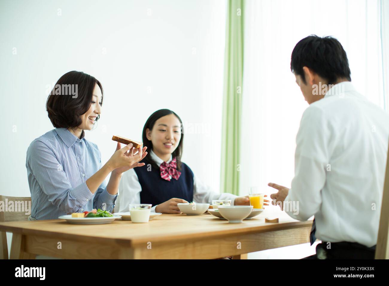 Familles japonaises qui prennent leur petit déjeuner Banque D'Images