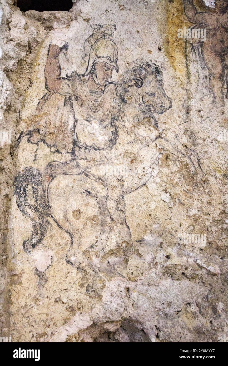 Peinture d'un soldat d'équitation dans la cathédrale de Gerace, Calabre (Italie) Banque D'Images