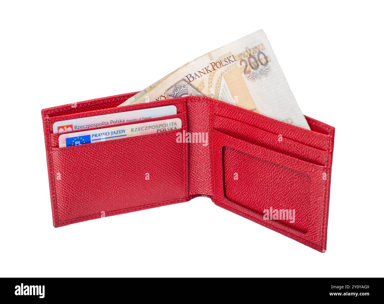 Portefeuille rouge avec monnaie polonaise et cartes d'identité Banque D'Images