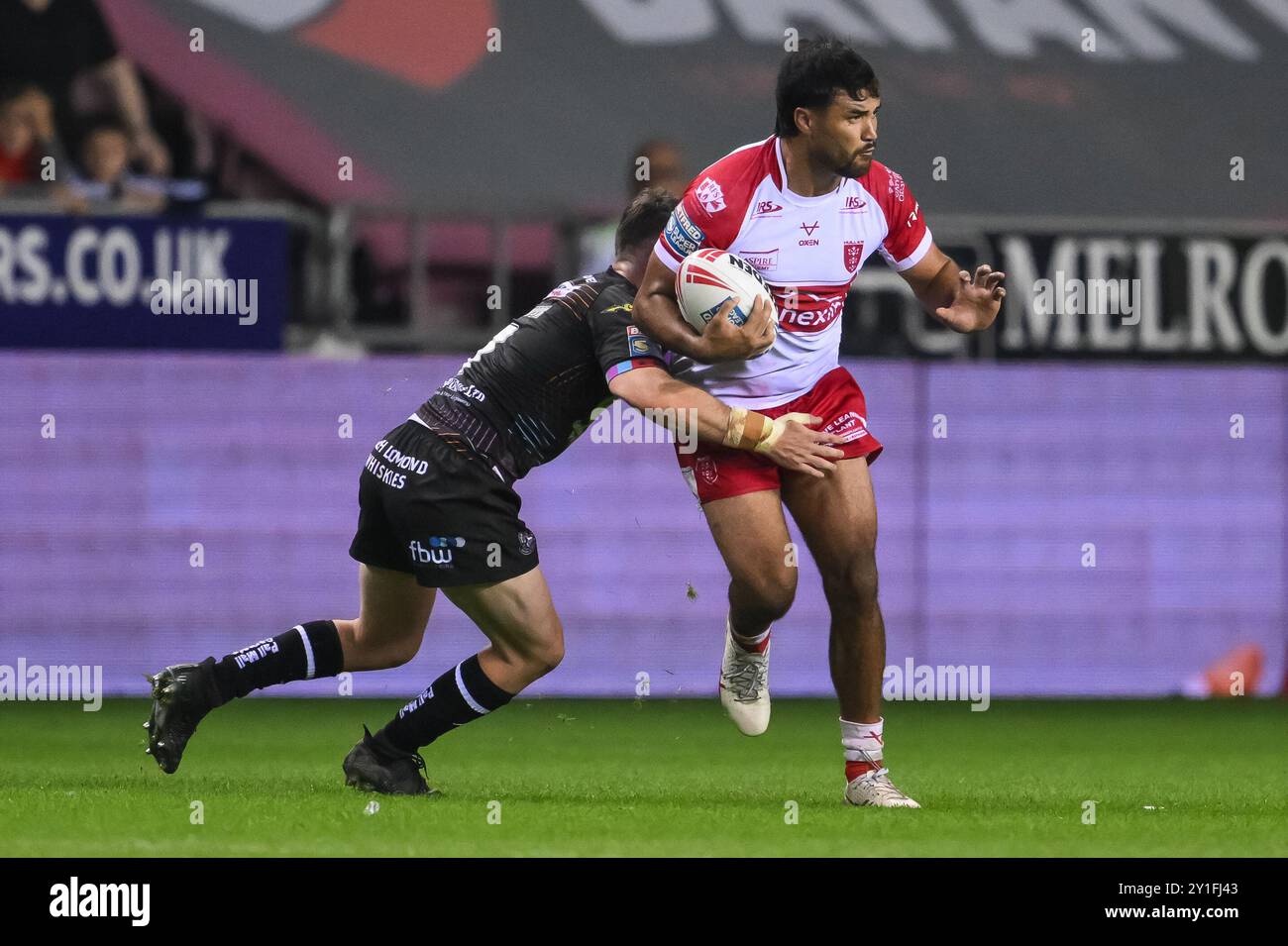 PETA Hiku de Hull KR est attaqué par Harry Smith de Wigan Warriors lors du match Betfred Super League Round 25 Warriors vs Hull KR au Brick Community Stadium, Wigan, Royaume-Uni, 6 septembre 2024 (photo par Craig Thomas/News images) Banque D'Images