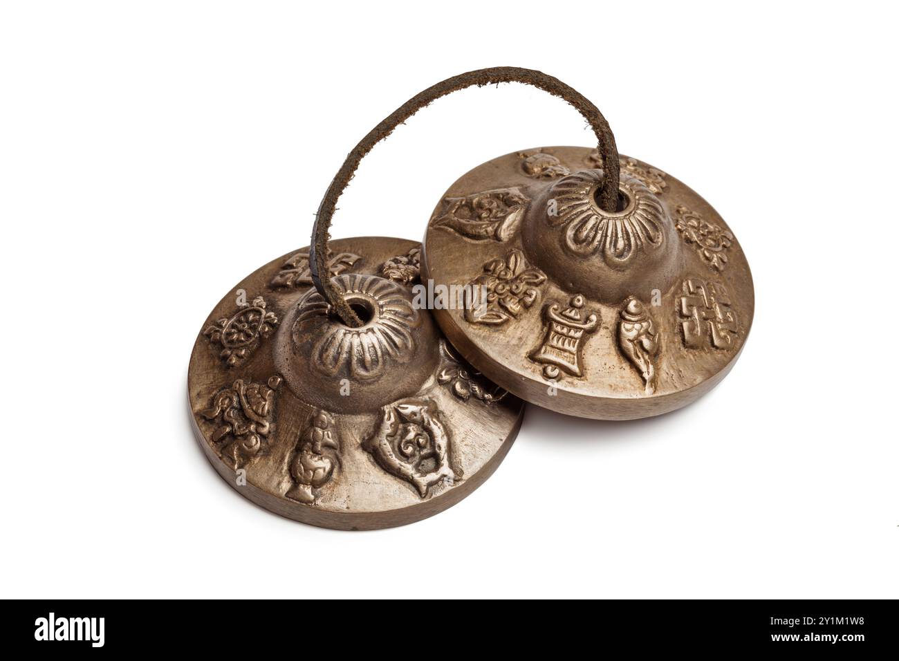 Cymbales bouddhistes tibétains isolés Banque D'Images