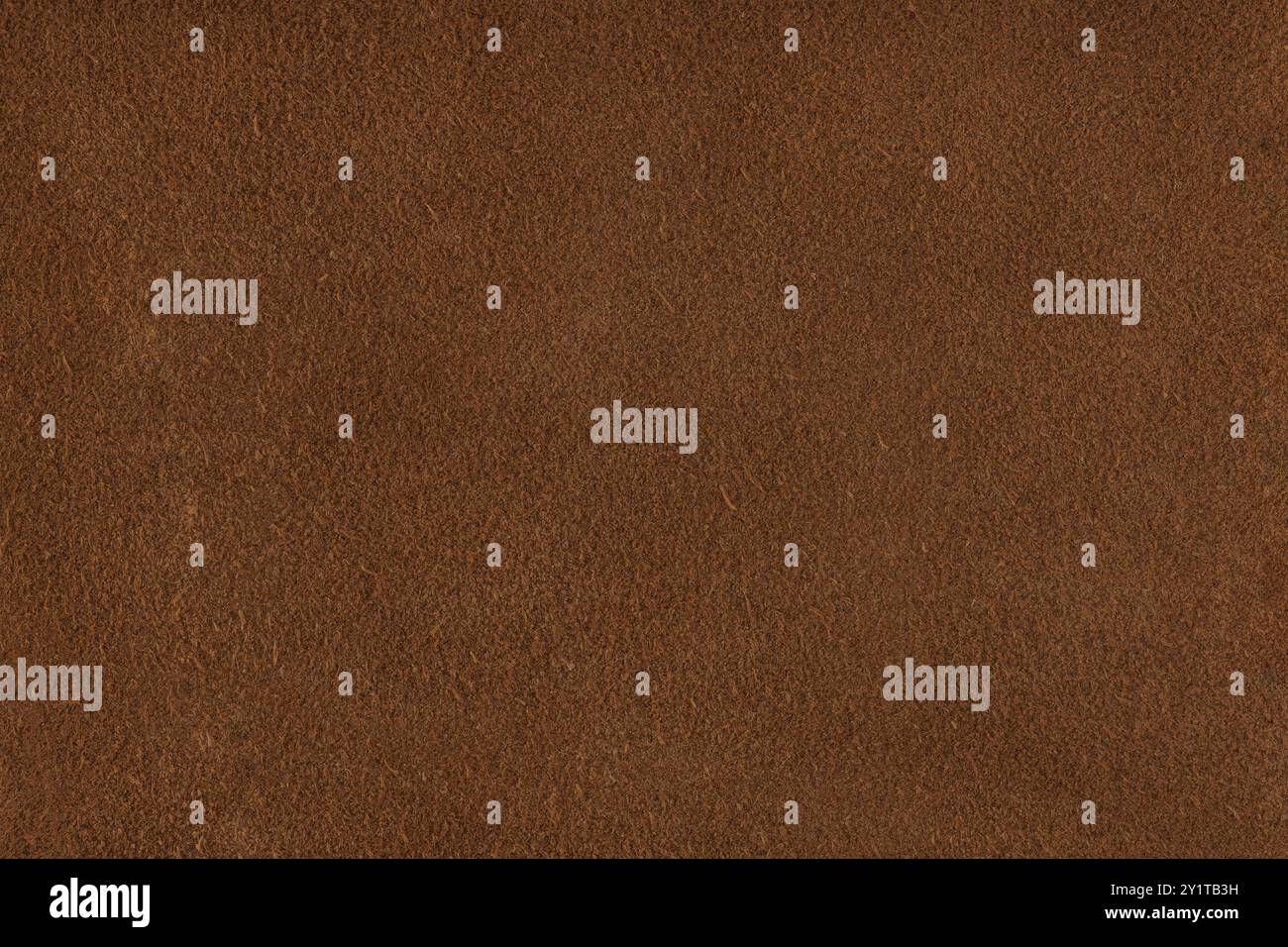 Texture en daim marron naturel. Texture ou fond de cuir chammy véritable, gros plan, haute résolution. Banque D'Images