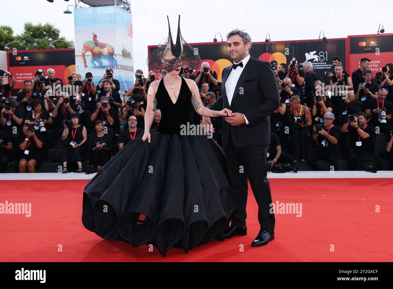 VENISE, ITALIE - 04 SEPTEMBRE : Lady Gaga et Michael Polansky assistent au tapis rouge 'Joker : folie à deux' lors du 81ème Festival International du film de Venise à Sala Grande le 04 septembre 2024 à Venise, Italie. (Photo de Mark Cape/Insidefoto) Banque D'Images