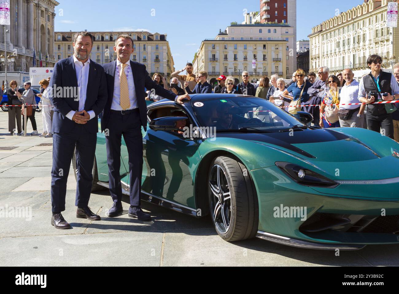 Turin, Italie. 13 septembre 2024. Ministre des infrastructures et des Transports Matteo Salvini avec Andrea Levy et une Pininfarina Battista Hyper GT lors de la journée d'ouverture du salon de l'automobile de Turin 2024 Banque D'Images