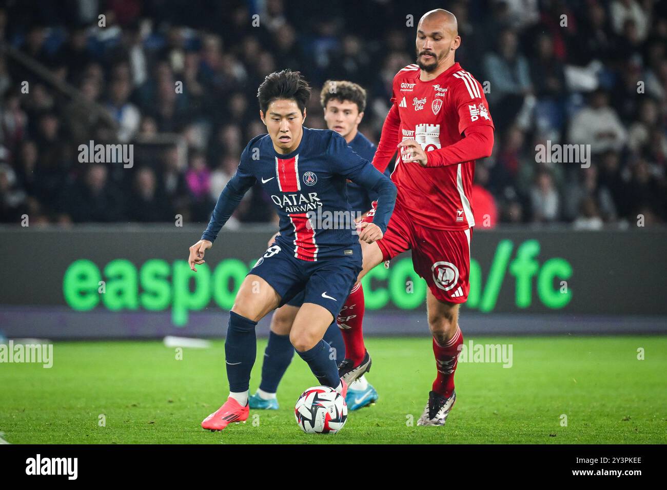 Paris, France. 14 septembre 2024. Lee Kang-IN du PSG et Ludovic AJORQUE de Brest lors du match de championnat de France de Ligue 1 entre le Paris Saint-Germain (PSG) et le stade Brestois (Brest) le 14 septembre 2024 au stade Parc des Princes à Paris, France - photo Matthieu Mirville/DPPI crédit : DPPI Media/Alamy Live News Banque D'Images