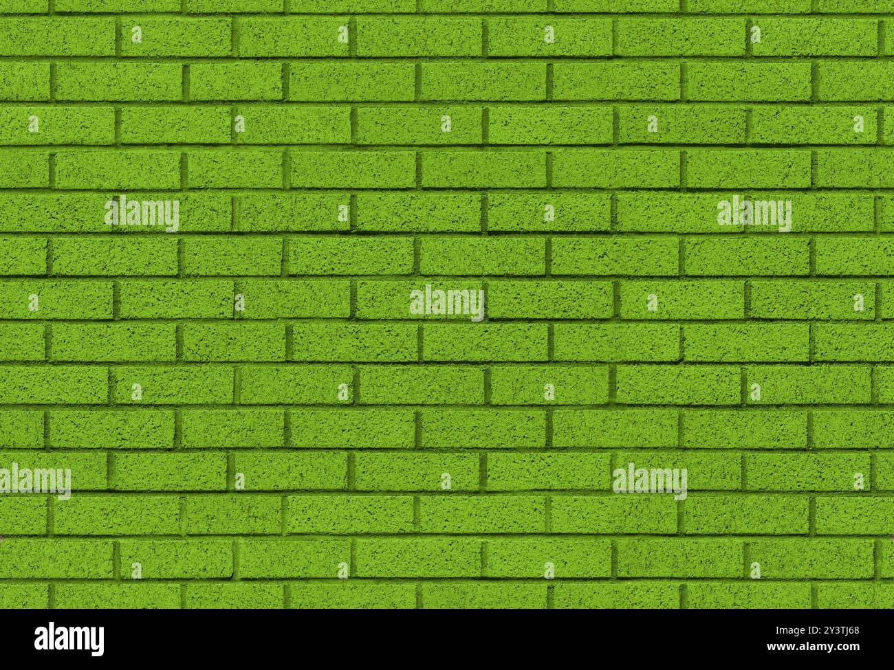 Image de texture de fond sans couture de mur de briques vertes. Peinture verte appliquée à la surface de maçonnerie de bloc. Un intérieur moderne et extérieur et tuile de toile de fond. Banque D'Images