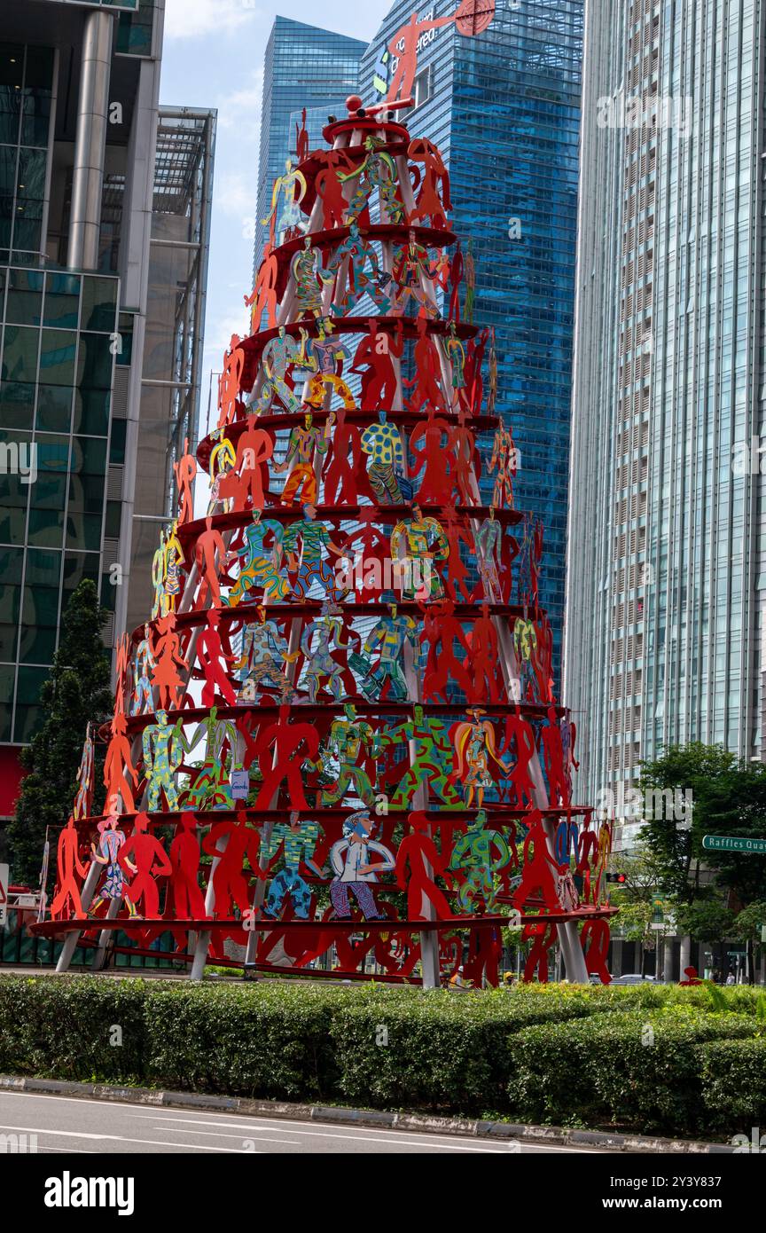 Une sculpture colorée de 18,35 mètres de haut en forme de cône de 175 figures en forme d'homme, intitulée ; «Momentum.» Il est le plus haut de Singapour, et a été créé par Banque D'Images